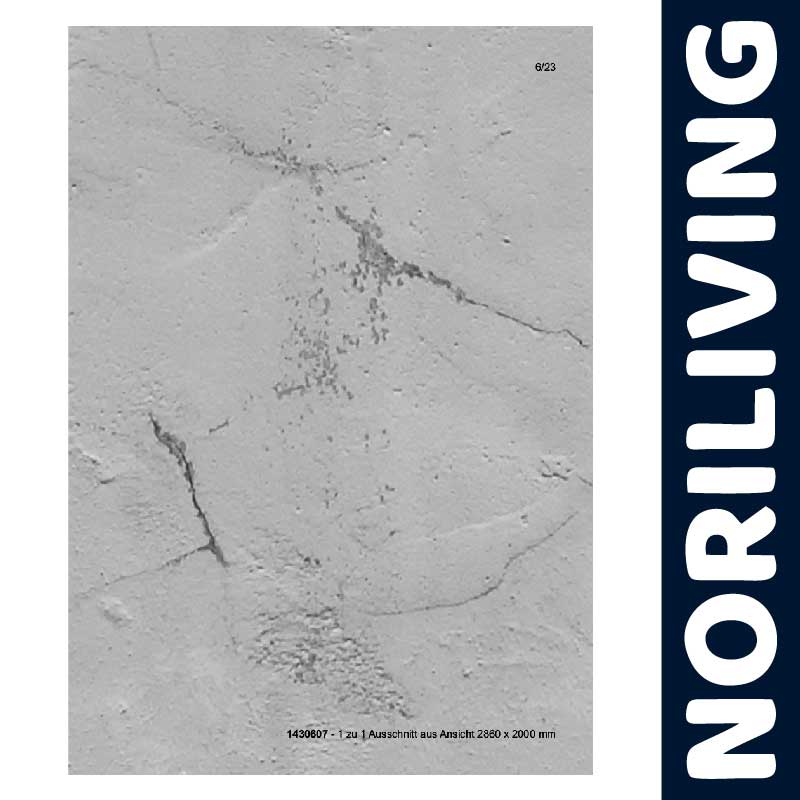 Detailansicht einer grauen Betonoptik Wandverkleidung mit feinen Rissen und Textur