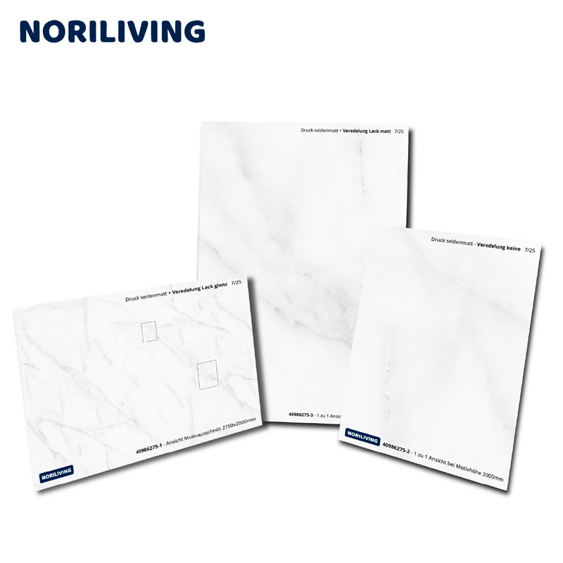 Drei weiße Marmorplatten mit seidenmatter Oberfläche und verschiedenen Veredelungen von NORILIVING